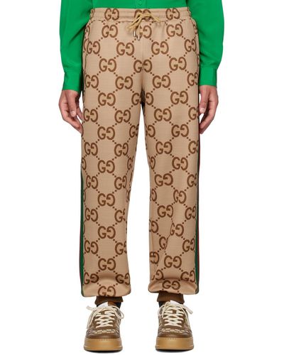 Gucci Pantalon de détente brun clair à logos gg - Multicolore