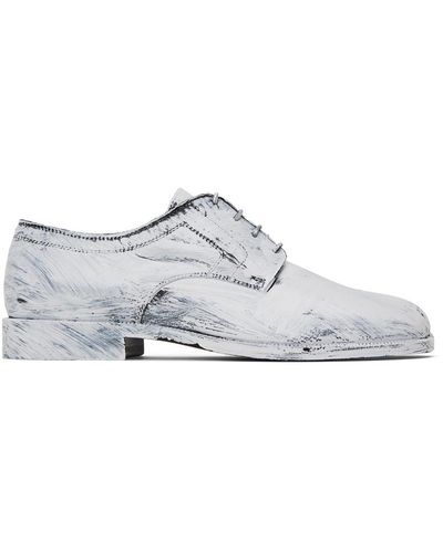 Maison Margiela Derbys noir et blanc à effet bianchetto