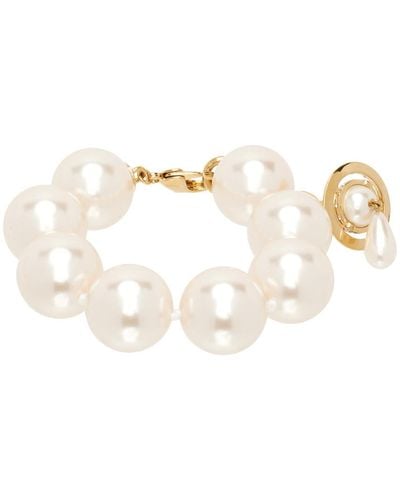 Vivienne Westwood Bracelet doré et blanc à perles et à pendentif - Noir