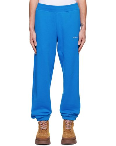 Moncler Pantalon de détente bleu à logo contrecollé