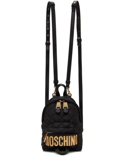 Moschino Mini sac à dos matelassé noir à écussons à logo