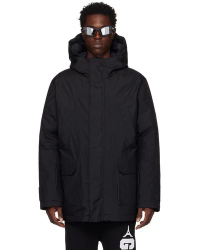 Givenchy Blouson noir à capuche rembourré en duvet