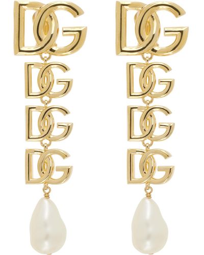 Dolce & Gabbana Boucles d'oreilles à clip dorées à logos - Métallisé