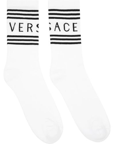 Versace Chaussettes à logo imprimé - Blanc