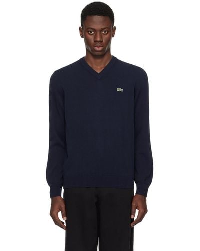 Lacoste Pull bleu marine à col en v