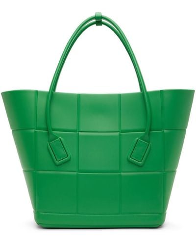 https://cdna.lystit.com/400/500/tr/photos/ssense/912b20a8/bottega-veneta-GrassGrassGS-Medium-Arco-Shopping-Tote.jpeg