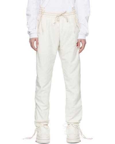 KANGHYUK Pantalon de survêtement blanc cassé édition reebok