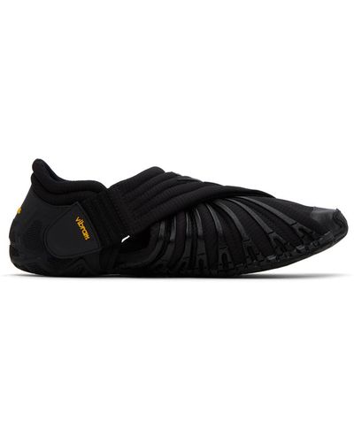 Suicoke Chaussures basses à enfiler futon noires