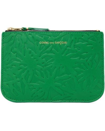 Comme des Garçons Comme des garçons wallets pochette verte à motif graphique gaufré