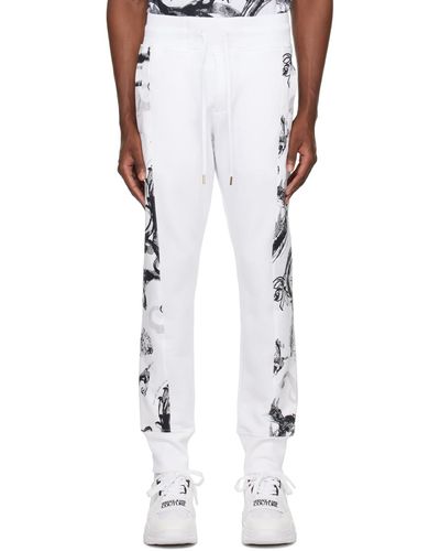 Versace Pantalon de survêtement blanc à motif watercolor couture