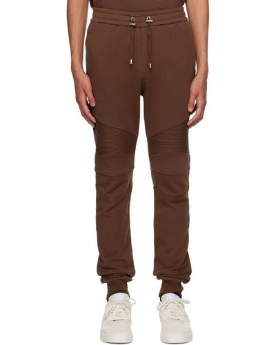 Balmain Pantalon de survêtement brun à logo floqué - Marron