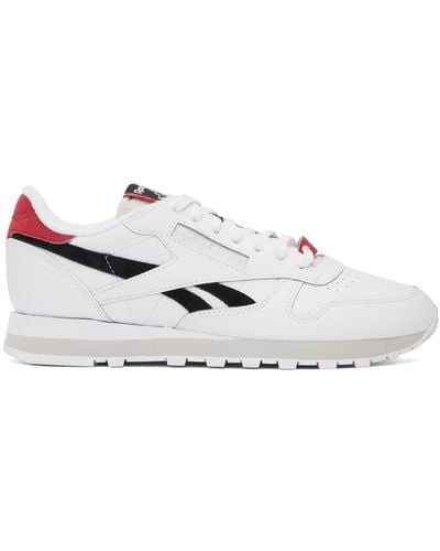 Reebok Baskets blanc et noir en cuir