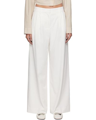 REMAIN Birger Christensen Pantalon blanc à plis