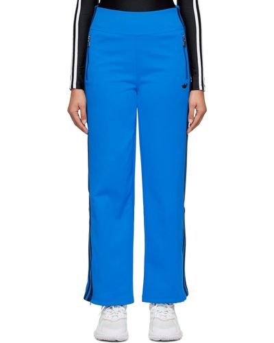 adidas Originals Pantalon de détente bleu à rayures