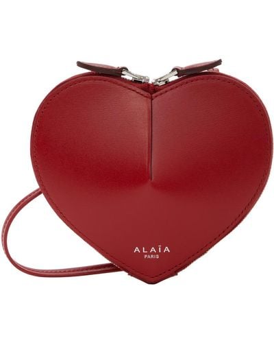 Alaïa Alaïa mini pochette à monnaie 'le cœur' rouge