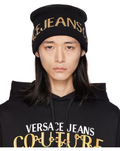 Versace Bonnet noir à logo en tricot jacquard