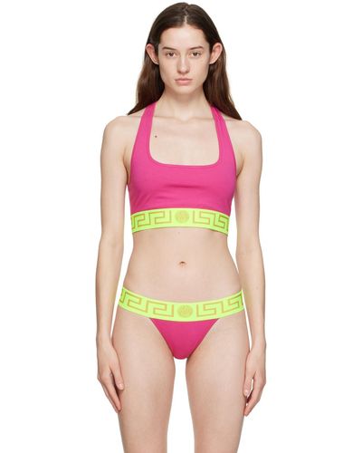 Versace Soutien-gorge de sport rose et vert à motif à clé grecque