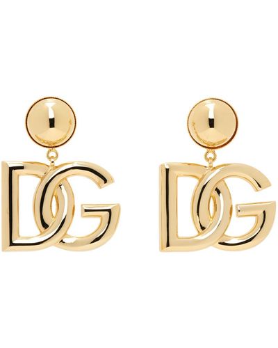 Dolce & Gabbana Boucles d'oreilles dorées à logo dg - Jaune