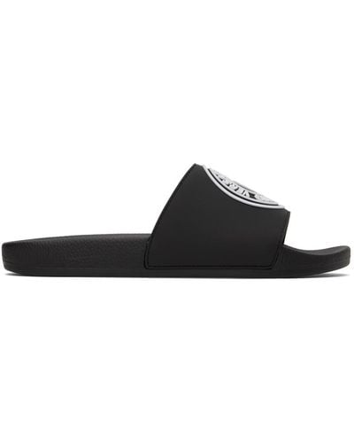 Versace Jeans Couture Sandales à enfiler noires à logo gaufré