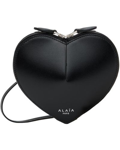 Alaïa Alaïa mini pochette à monnaie 'le cœur' e - Noir