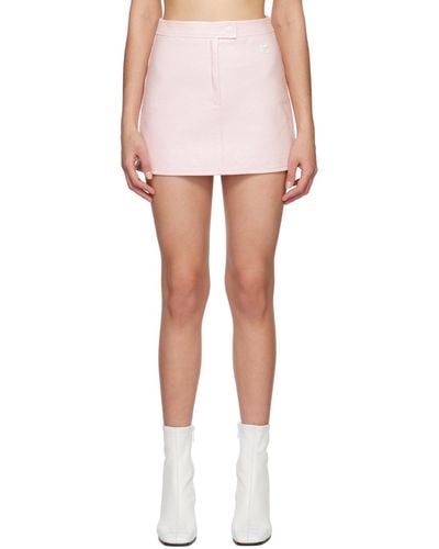 Courreges Mini-jupe rose à braguette à glissière