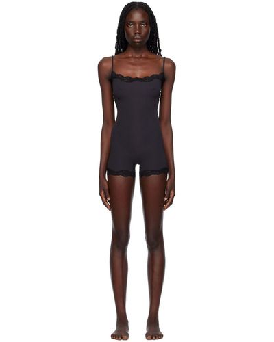 Black Skims Jumpsuits and rompers for Women | Lyst