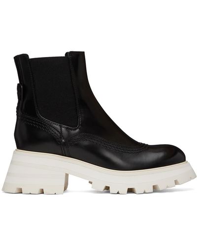 Alexander McQueen Bottes chelsea wander noir et blanc