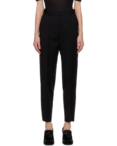 Totême Pantalon noir à plis