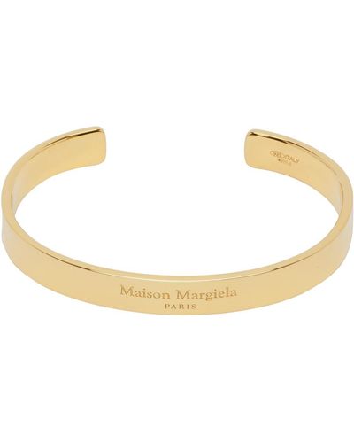 Maison Margiela Bracelet manchette doré à logo gravé - Noir