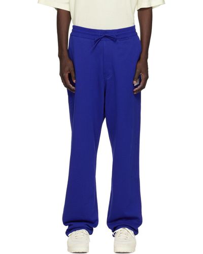 Y-3 Pantalon de survêtement bleu à logo imprimé