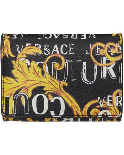 Versace Portefeuille noir à motif logo couture - Métallisé