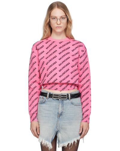 Balenciaga Pull écourté rose à motif à logo - Rouge