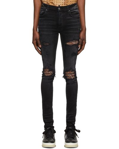 Amiri Trasher Jeans In Aged Black