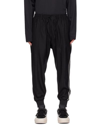 Y-3 Pantalon de détente noir à rayures