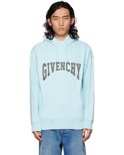 Givenchy Pull à capuche bleu à écusson