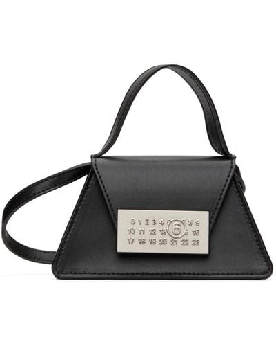 MM6 by Maison Martin Margiela Mini sac à bandoulière noir à logo numérique