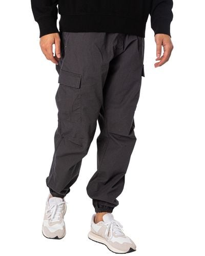 Carhartt Relaxed Tapered Cargo Sweatpants - Black