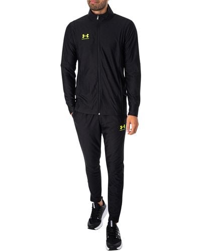 https://cdna.lystit.com/400/500/tr/photos/stand-out/9add612a/under-armour-BlackYellow-Challenger-Tracksuit.jpeg