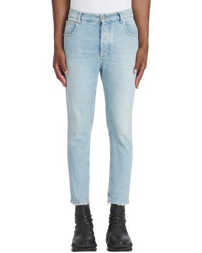 Balmain Slim-fit Jeans In Light Blue Denim With Embossed Logo