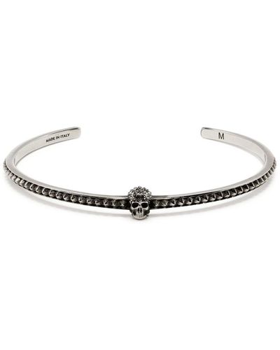 Alexander McQueen Bracciale rigido con borchie - Bianco