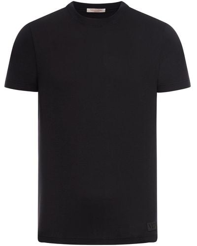 Valentino Garavani T-shirt in cotone con applicazione logo - Nero