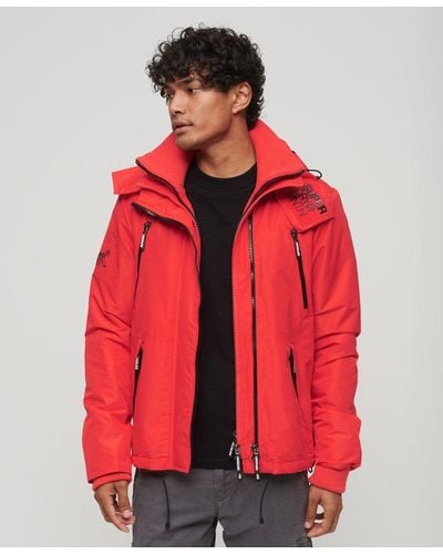 Red Superdry Jackets for Men | Lyst