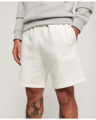Superdry Short ample sportswear à motif en relief - Blanc