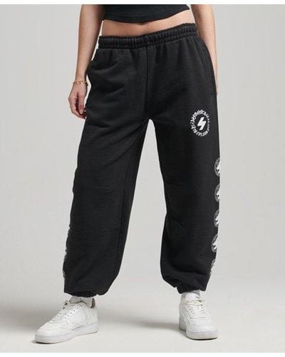 Superdry Pantalon de survêtement unisexe avec logo globe s - Noir