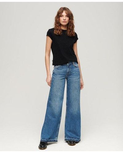 Superdry Jeans Met Uitlopende Pijpen En Onafgewerkte Zoom - Blauw