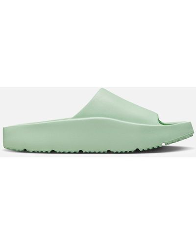 womens green nike slides