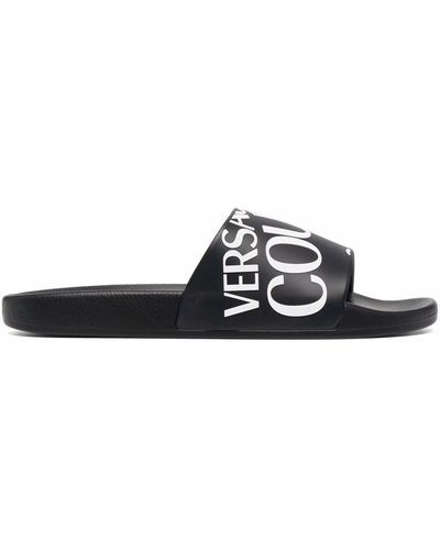 Versace Jeans Couture logo-embossed slip-on slides - Black