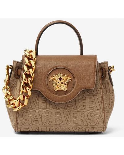 Versace Small Medusa All-over Logo Top Handle Bag - Brown