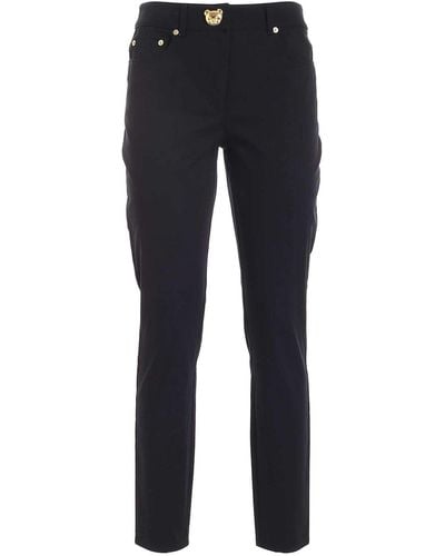 Moschino Teddy Logo Detail Trousers In - Blue