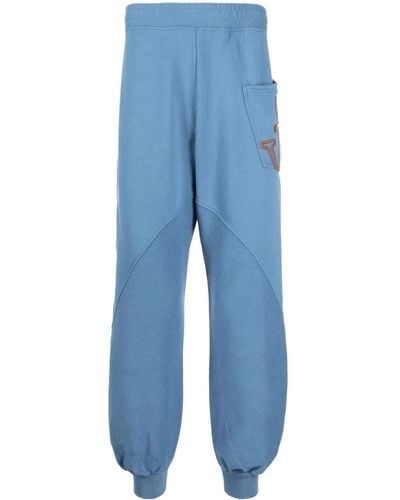JW Anderson Paneled Organic Cotton Track Pants - Blue